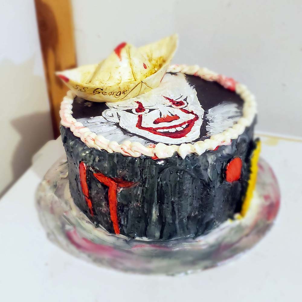 Cake, frosting, melting chocolate and food dye.