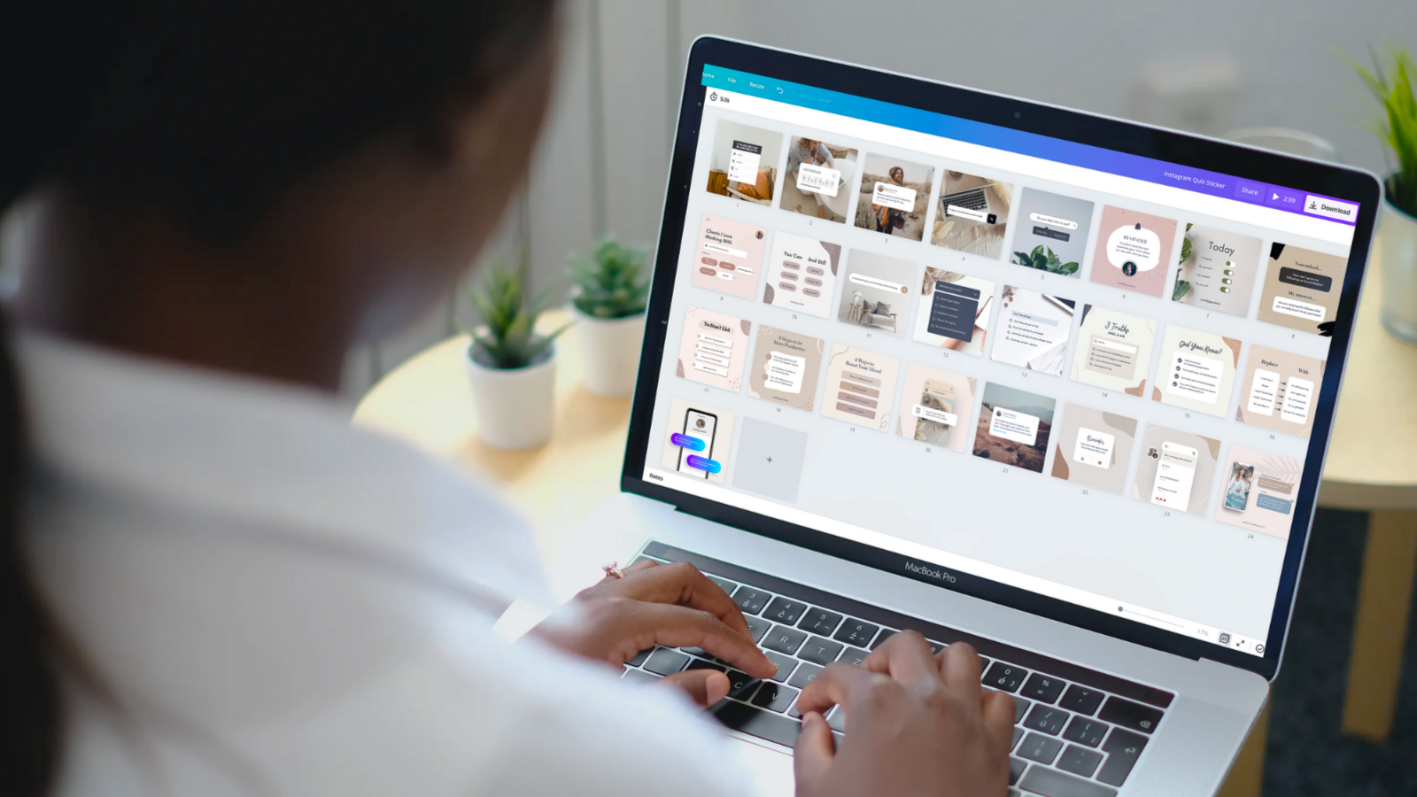 woman creating an infographic on a laptop