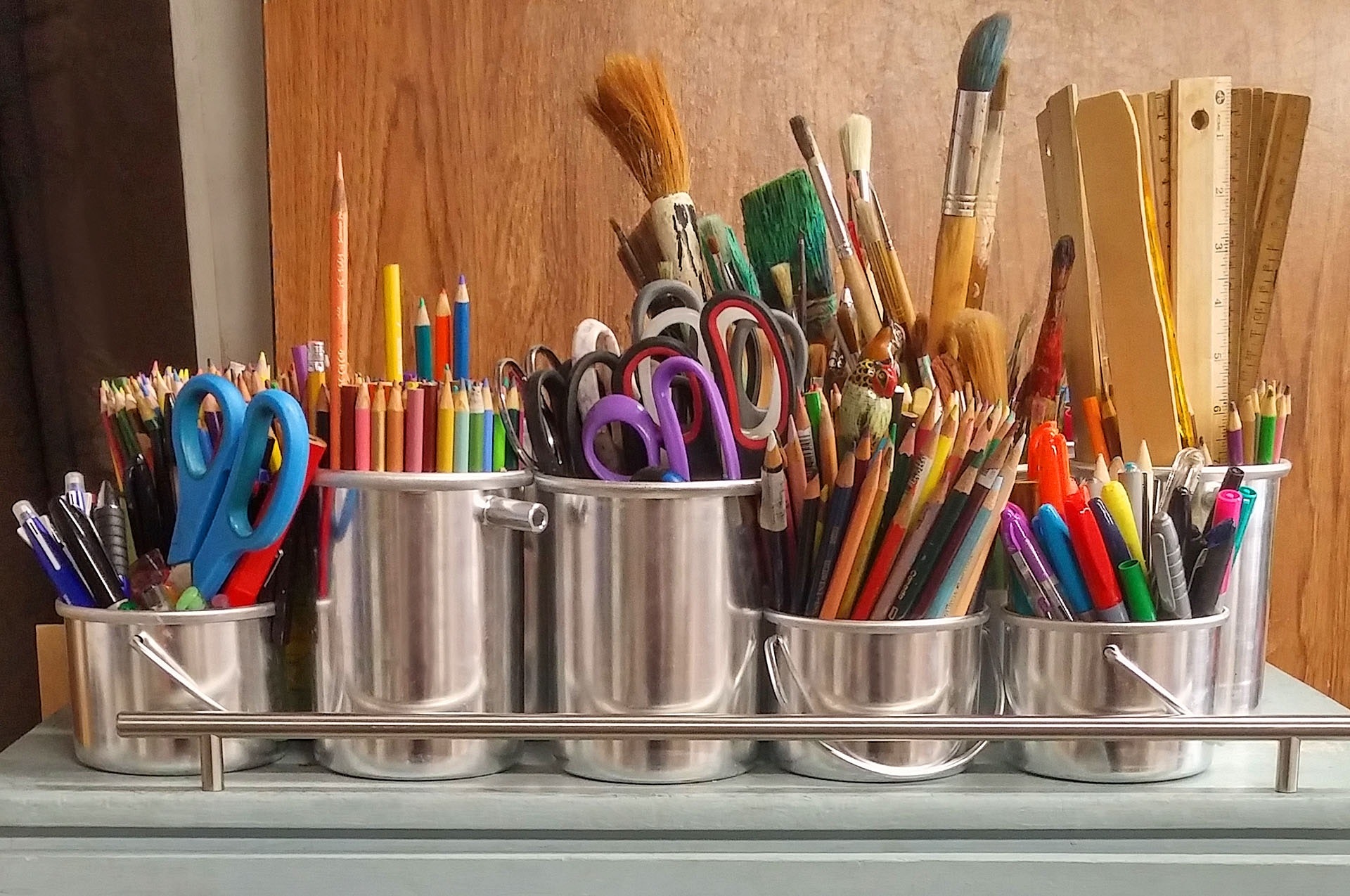 art supplies in cans