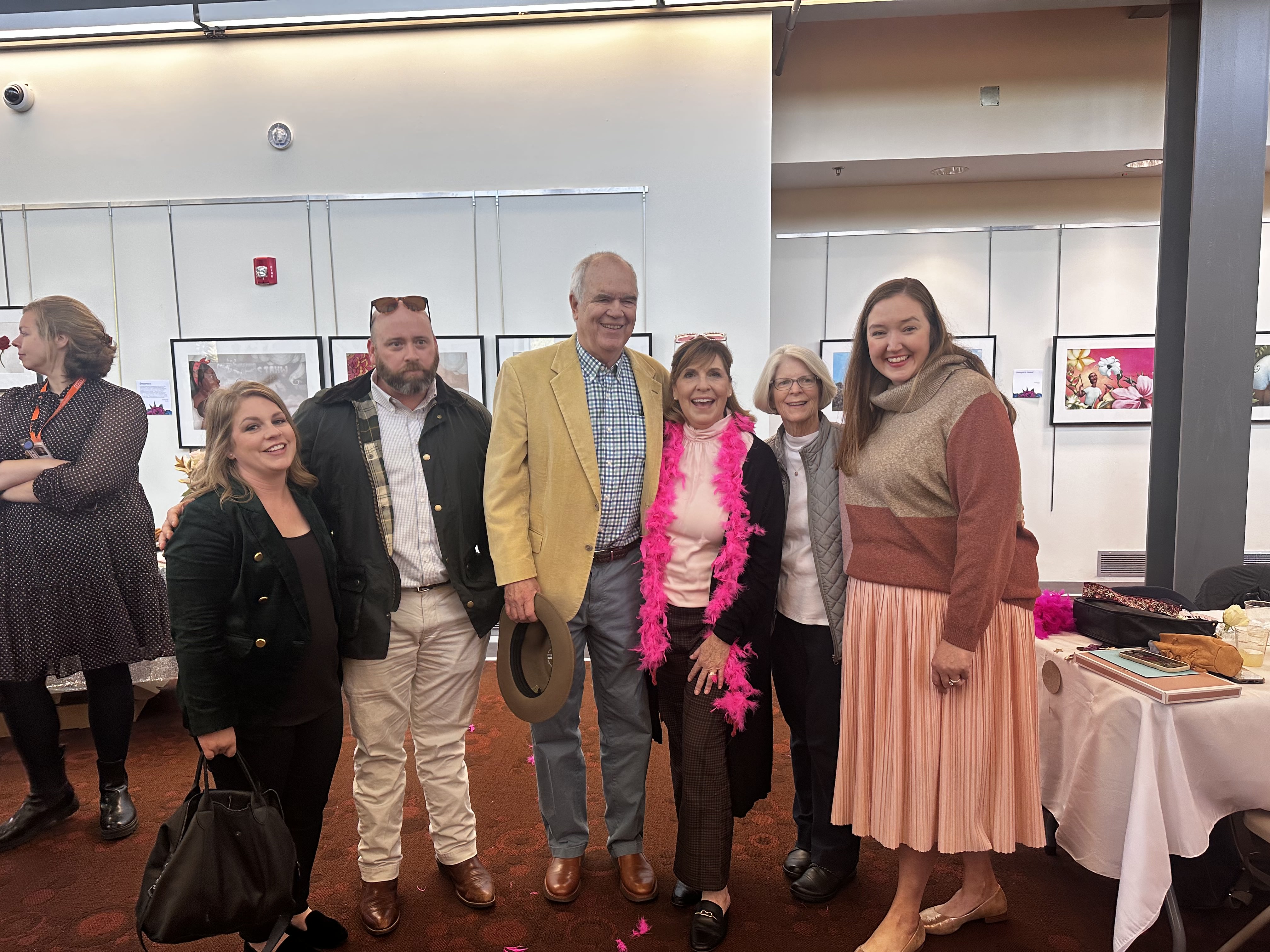 Lisa Donavan with guests at retirement party