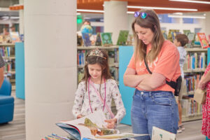 Family enjoying the new Martin Children's Center at Main Library